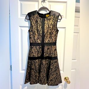 Nicole Miller Mini Dress with Gold Patterns and Black Leather Details. Size 4